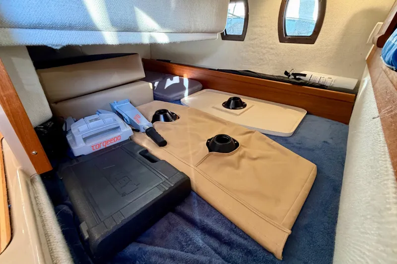 Slide: The Image of Interior cabin storage of 2018 Ranger Tugs R-29 CB with equipment and accessories. - 29