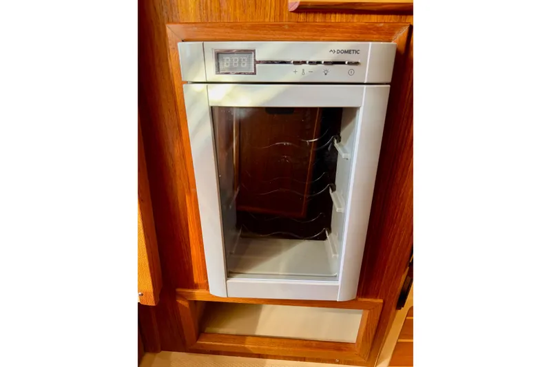 Slide: The Image of Dometic fridge in 2018 Ranger Tugs R-29 CB boat interior. - 48