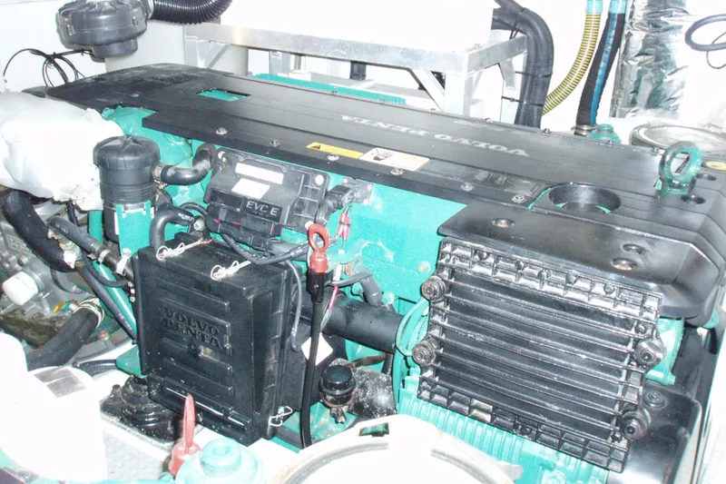 Slide: The Image of Engine compartment of a 2015 Princess V48 yacht featuring a Volvo Penta engine. - 43