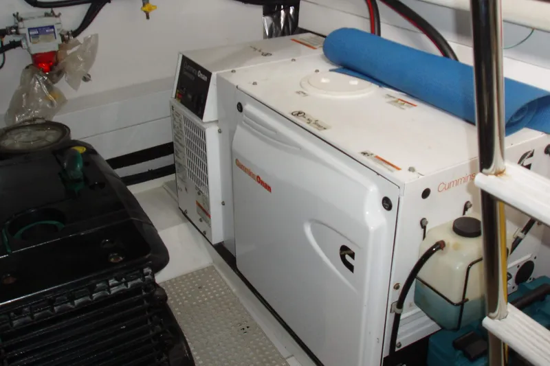 Slide: The Image of Engine room of 2015 Princess V48 yacht with Cummins Onan generator. - 44