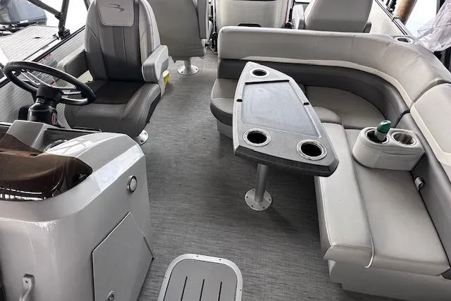 Slide: The Image of 2023 Bennington SX 21 Fishing boat interior with seating and steering console. - 4