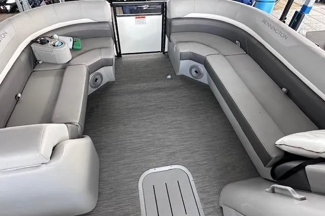 Slide: The Image of 2023 Bennington SX 21 Fishing boat interior with gray seating and flooring. - 5