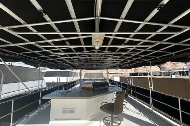 Slide: The Image of 2007 Sumerset Lakeview HD houseboat with covered deck and seating area. - 31