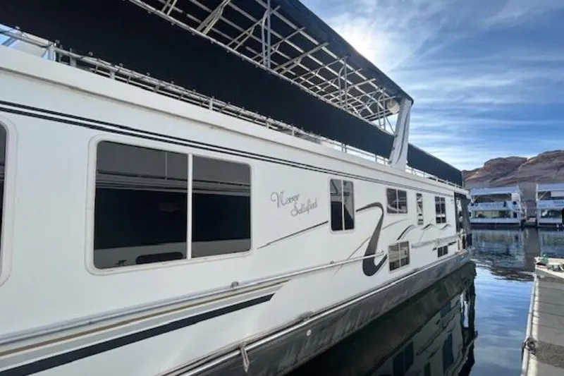 Slide: The Image of 2007 Sumerset Lakeview HD houseboat docked on a sunny day. - 5