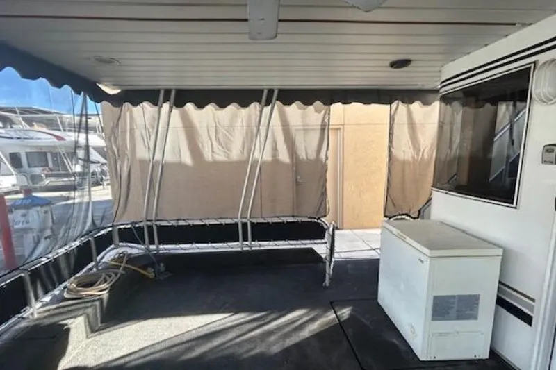 Slide: The Image of 2007 Sumerset Lakeview HD houseboat interior with covered deck and storage unit. - 7