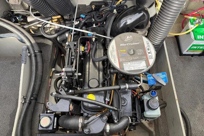 Slide: The Image of Engine compartment of a 2011 Bayliner 185 with MerCruiser 3.0L engine. - 34