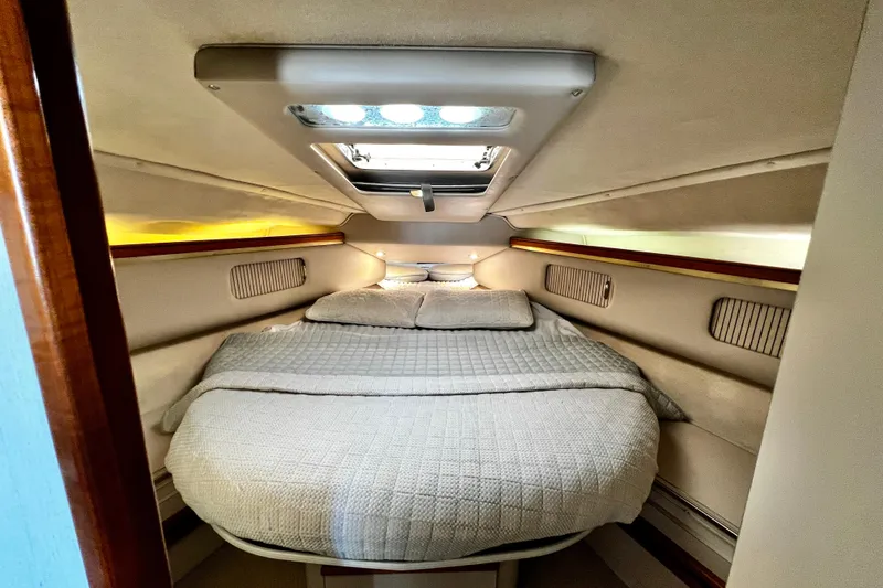 Slide: The Image of Cozy cabin interior of 1989 Cruisers Yachts 3670 Esprit with a comfortable bed. - 25