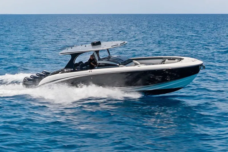 Slide: The Image of High-speed Mystic M4200 boat cruising on open water, 2020 model. - 11