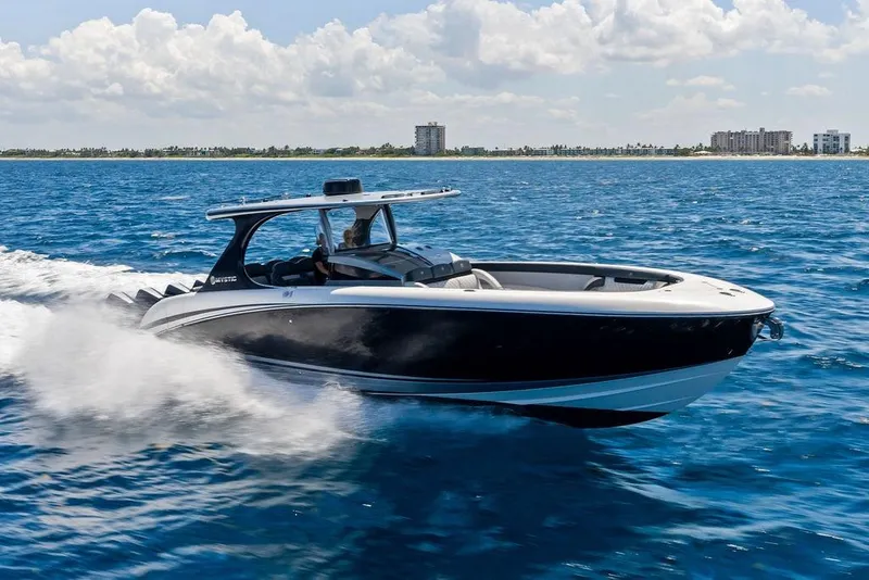 The Image of High-speed Mystic M4200 boat cruising on open water, 2020 model. - 1