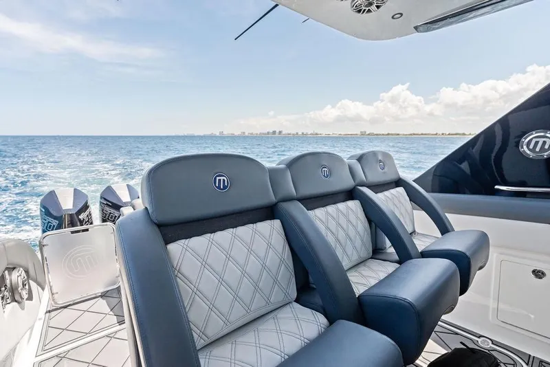 Slide: The Image of Luxury seating on a 2020 Mystic M4200 boat with ocean view. - 30