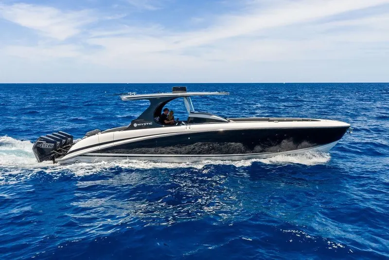 Slide: The Image of Luxury Mystic M4200 boat cruising on open sea, 2020 model. - 9
