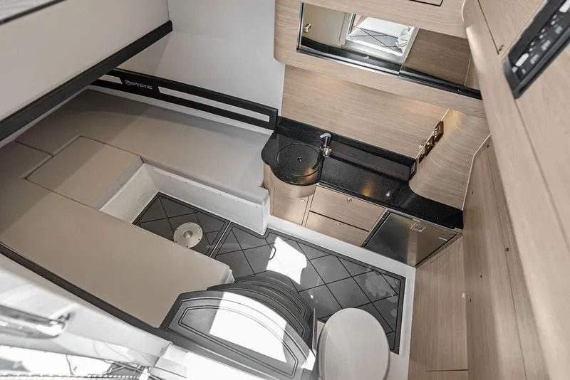 Slide: The Image of Modern interior of 2020 Mystic M4200 yacht with sleek kitchenette and seating area. - 37