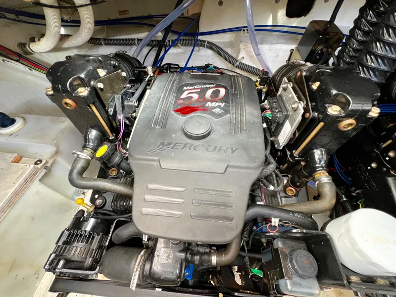 Slide: The Image of Engine compartment of a 2008 Bayliner 320 with dual MerCruiser engines. - 30