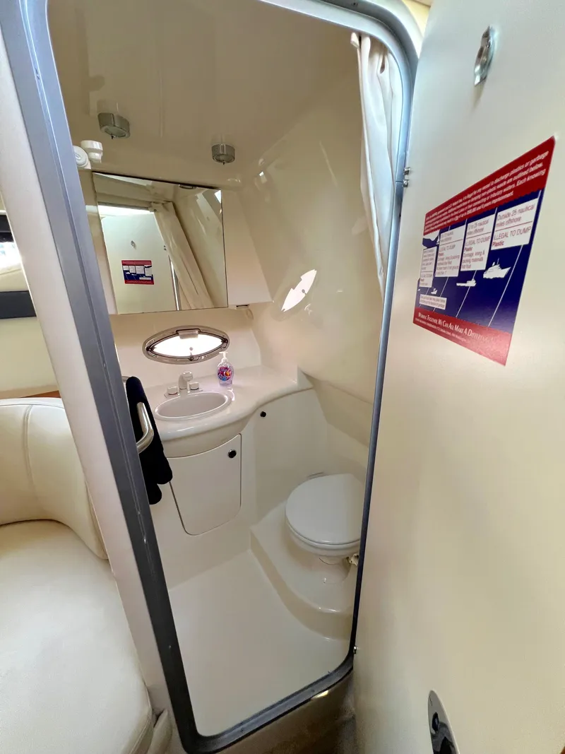 Slide: The Image of Control panel of a 2008 Bayliner 320 boat's marine air system. - 46