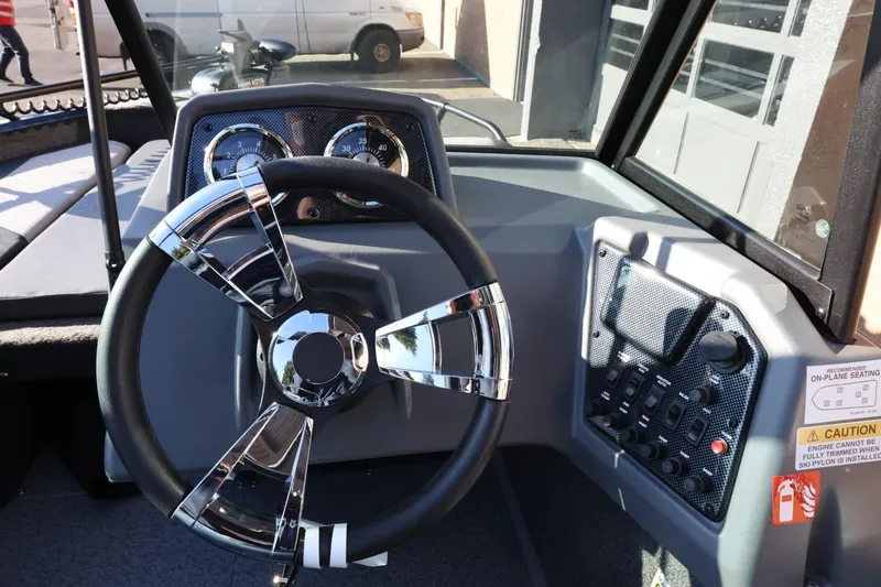 Slide: The Image of Steering wheel and dashboard of 2026 Lowe Fish & Ski 1625 boat. - 26