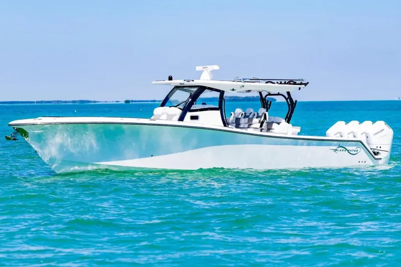 The Image of 2025 Blackwater 43 Luxury Fish boat cruising on clear blue water. - 1