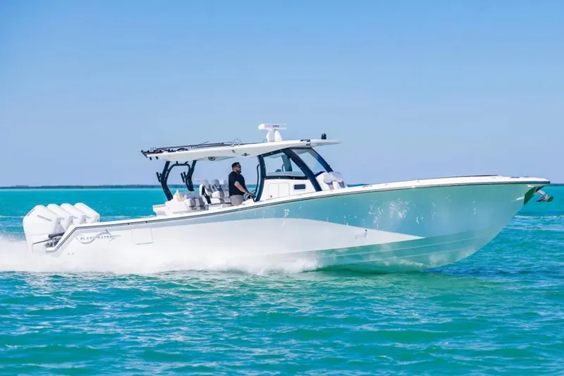 Slide: The Image of 2025 Blackwater 43 Luxury Fish boat cruising on turquoise waters. - 3