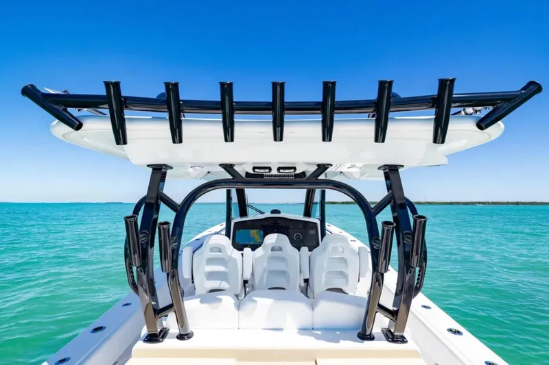 Slide: The Image of 2025 Blackwater 43 Luxury Fish boat on turquoise water, featuring sleek design and modern amenities. - 34