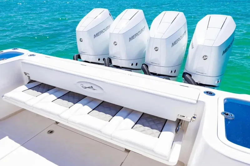 Slide: The Image of 2025 Blackwater 43 Luxury Fish boat with four Mercury engines, featuring a sleek white design. - 38