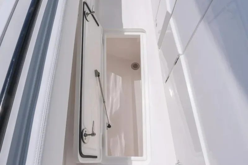 Slide: The Image of Open storage compartment on 2025 Blackwater 43 Luxury Fish boat, showcasing sleek design. - 47