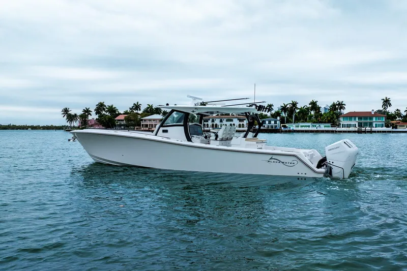 Slide: The Image of 2026 Blackwater 43 Luxury Fish boat cruising on a serene waterway. - 63