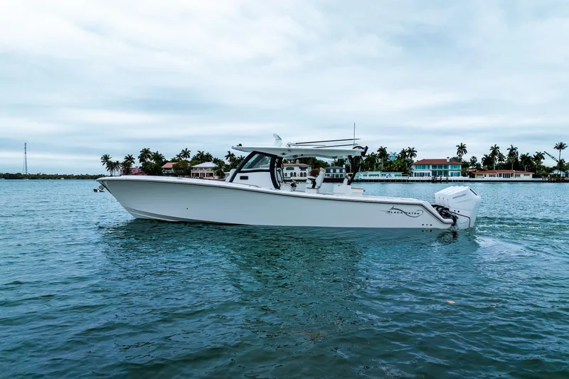 Slide: The Image of 2026 Blackwater 43 Luxury Fish boat cruising on a tropical waterway. - 64