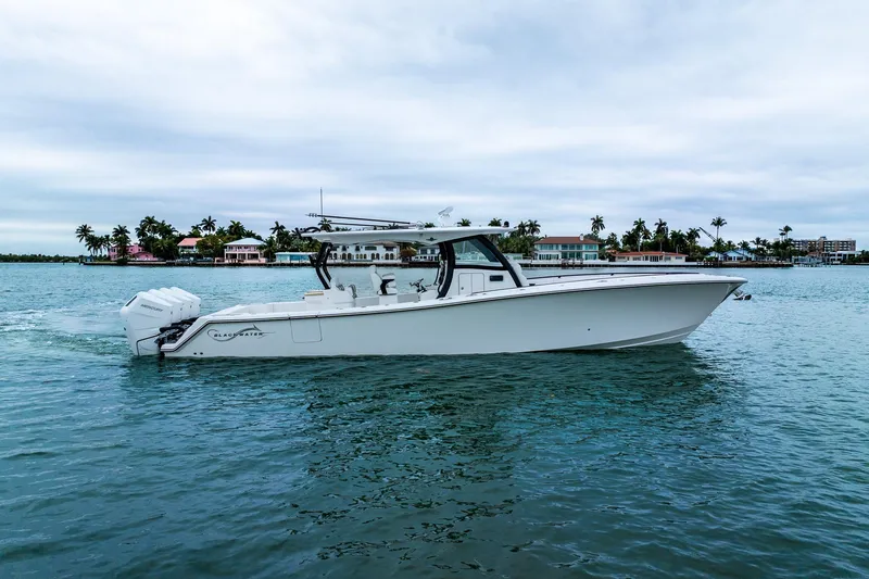 Slide: The Image of 2026 Blackwater 43 Luxury Fish boat cruising on calm waters near tropical shoreline. - 69