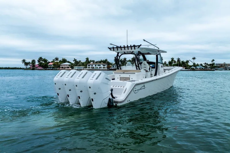 Slide: The Image of 2026 Blackwater 43 Luxury Fish boat cruising on tropical waters with palm trees in background. - 71