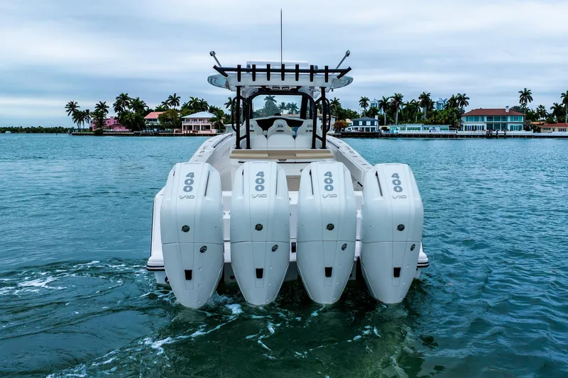 Slide: The Image of 2026 Blackwater 43 Luxury Fish boat with four powerful engines on a serene waterway. - 73