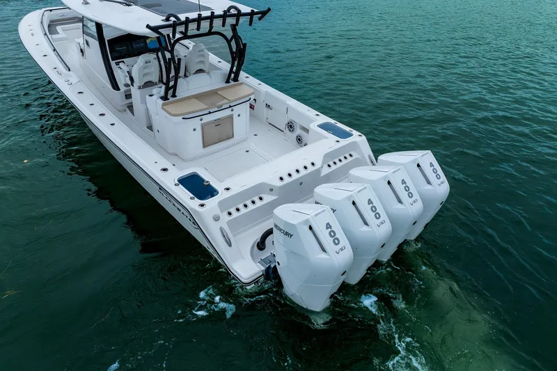 Slide: The Image of 2026 Blackwater 43 Luxury Fish boat with four powerful Mercury engines on water. - 74