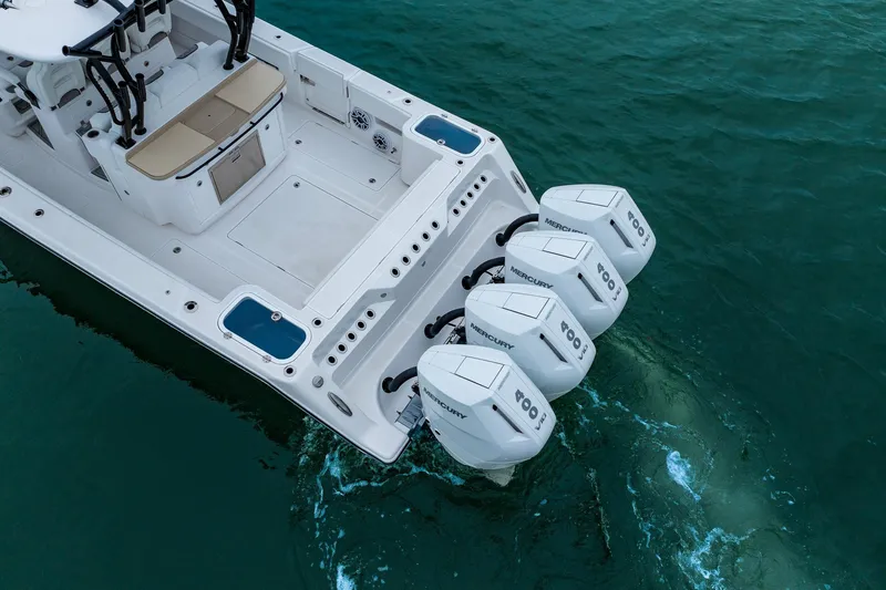 Slide: The Image of 2026 Blackwater 43 Luxury Fish boat with four powerful outboard engines on water. - 75