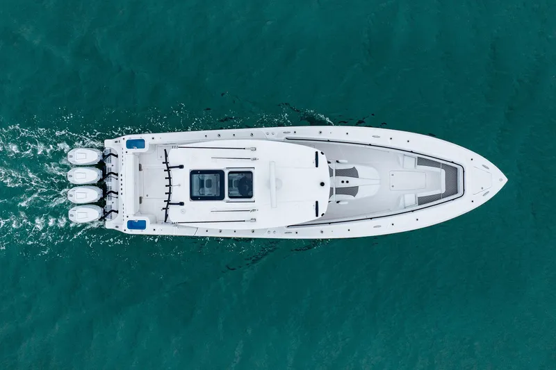 Slide: The Image of Aerial view of 2026 Blackwater 43 Luxury Fish boat cruising on turquoise water. - 76