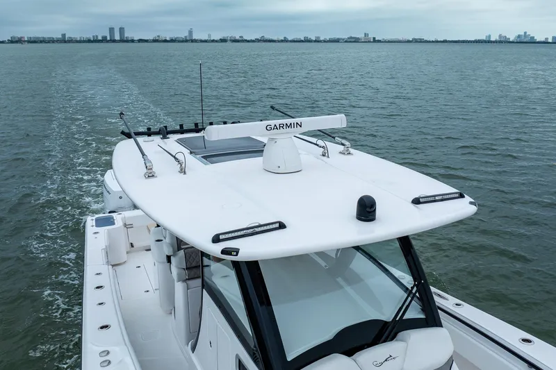 Slide: The Image of Luxury Blackwater 43 boat cruising on open water, showcasing sleek design and advanced navigation. - 78