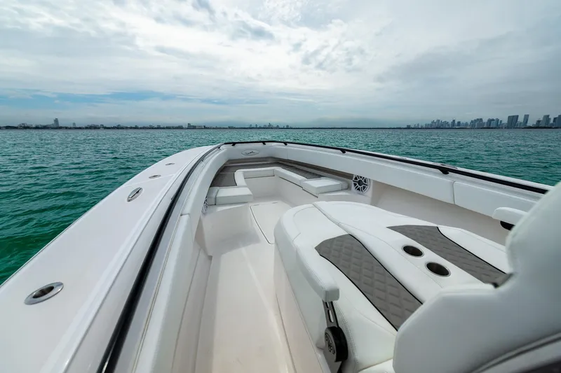 Slide: The Image of Luxurious 2026 Blackwater 43 boat interior with city skyline in the background. - 79