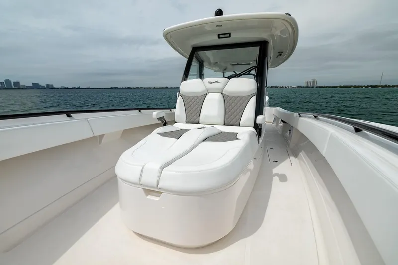 Slide: The Image of 2026 Blackwater 43 Luxury Fish boat with plush seating on open water. - 82