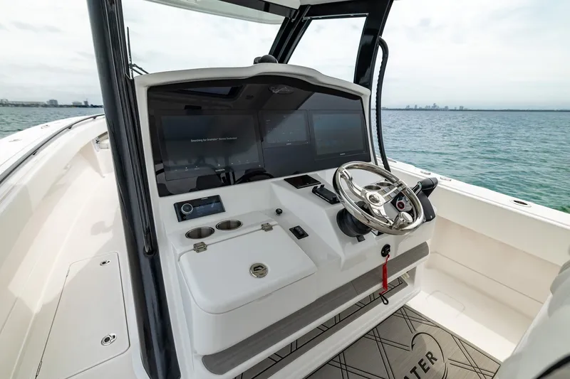 Slide: The Image of 2026 Blackwater 43 Luxury Fish boat helm with modern controls and ocean view. - 88