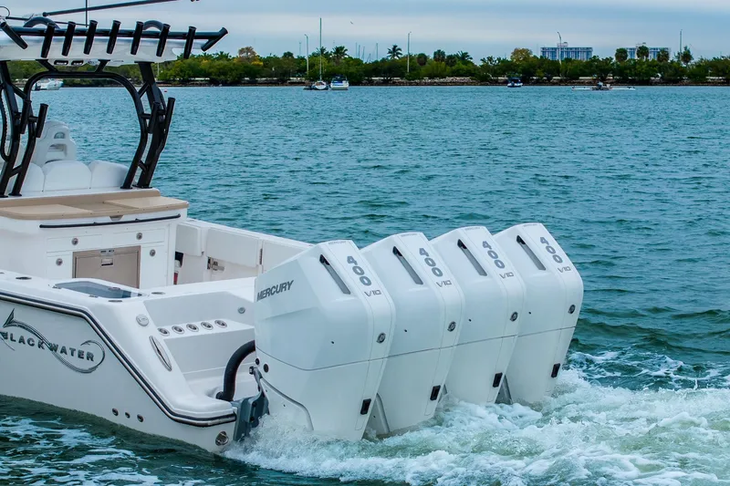 Slide: The Image of 2026 Blackwater 43 Luxury Fish boat with four Mercury engines on the water. - 91