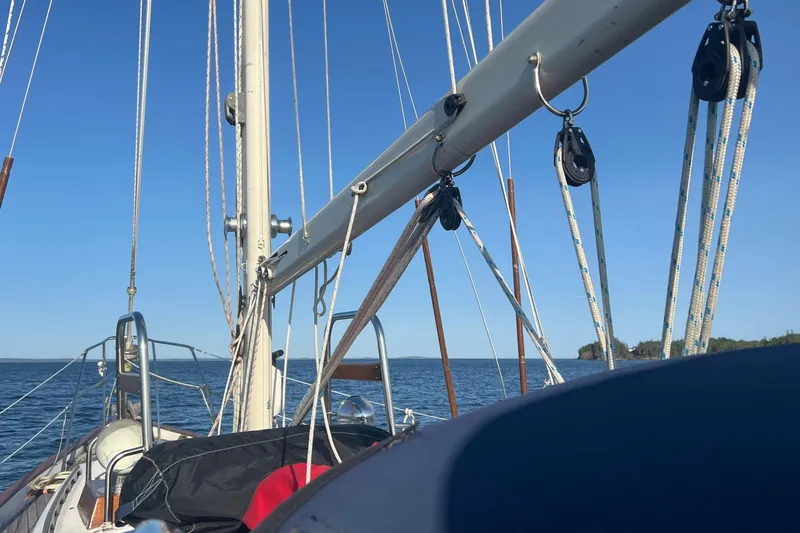 Slide: The Image of Sailing on a 1982 Pacific Seacraft 37 yacht, clear blue sky and ocean view. - 30