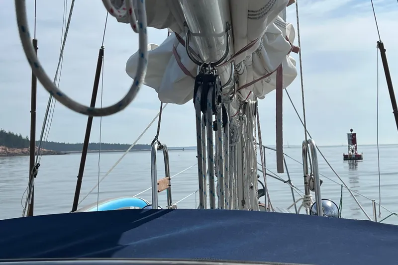 Slide: The Image of Sailing view from 1982 Pacific Seacraft 37, calm waters, distant buoy. - 31