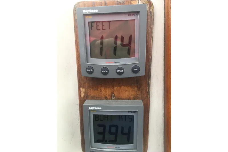Slide: The Image of Raytheon depth and speed displays on 1982 Pacific Seacraft 37 sailboat. - 46