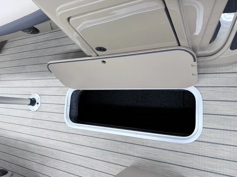 Slide: The Image of Sylvan X3 Party Fish 2026 storage compartment with open hatch. - 12