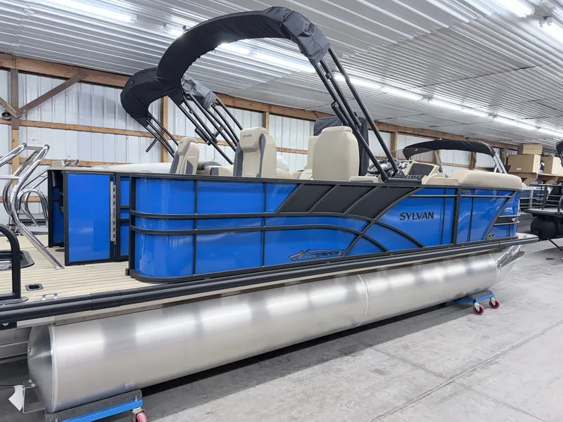 Slide: The Image of 2026 Sylvan X3 Party Fish pontoon boat in blue, Platinum Package. - 14