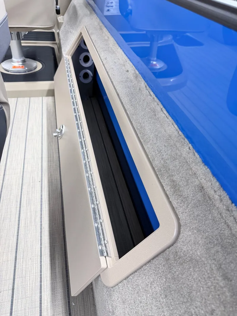 Slide: The Image of Sylvan X3 Party Fish 2026, open storage compartment interior view. - 18