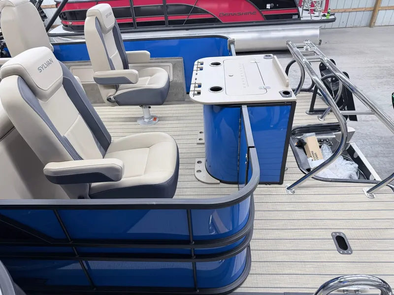Slide: The Image of 2026 Sylvan X3 Party Fish boat with Platinum Package, interior view. - 7