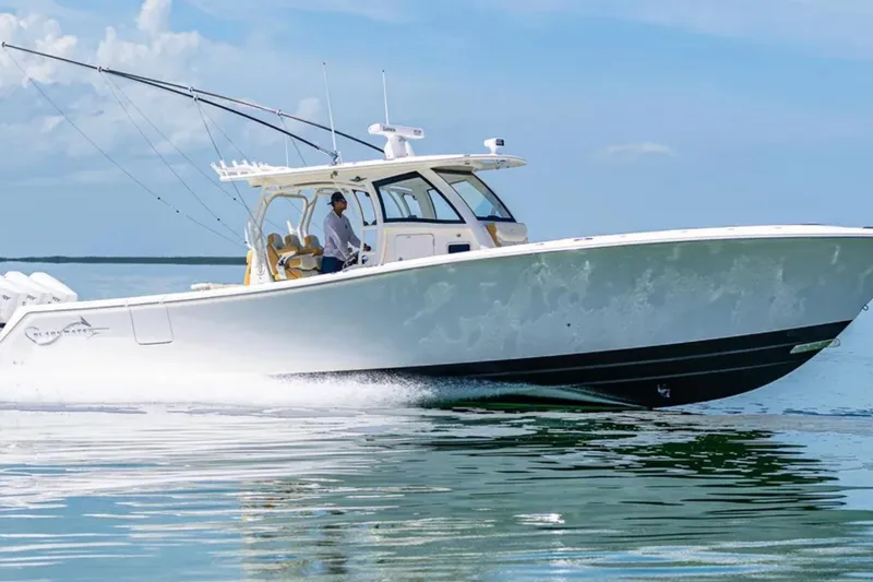 The Image of 2024 Blackwater 43 Sportfish boat cruising on calm water under a clear sky. - 1