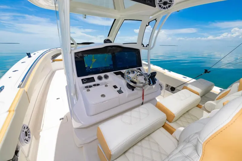 Slide: The Image of 2024 Blackwater 43 Sportfish boat interior with modern dashboard and luxurious seating. - 23