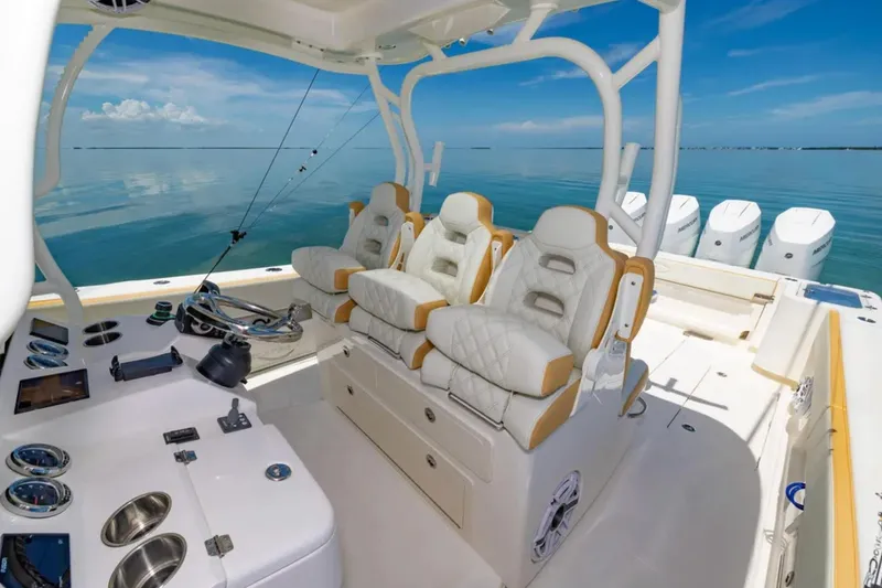 Slide: The Image of 2024 Blackwater 43 Sportfish boat interior with luxurious seating and advanced controls. - 28