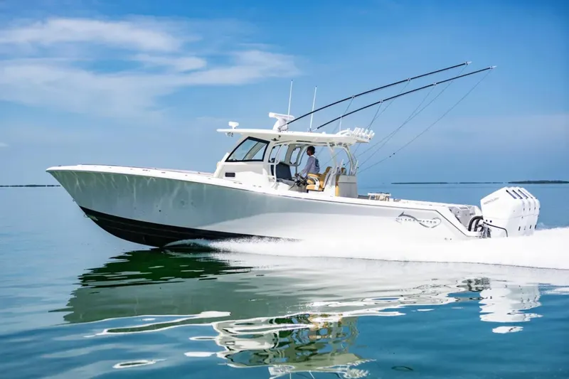 Slide: The Image of 2024 Blackwater 43 Sportfish boat cruising on calm blue waters. - 3