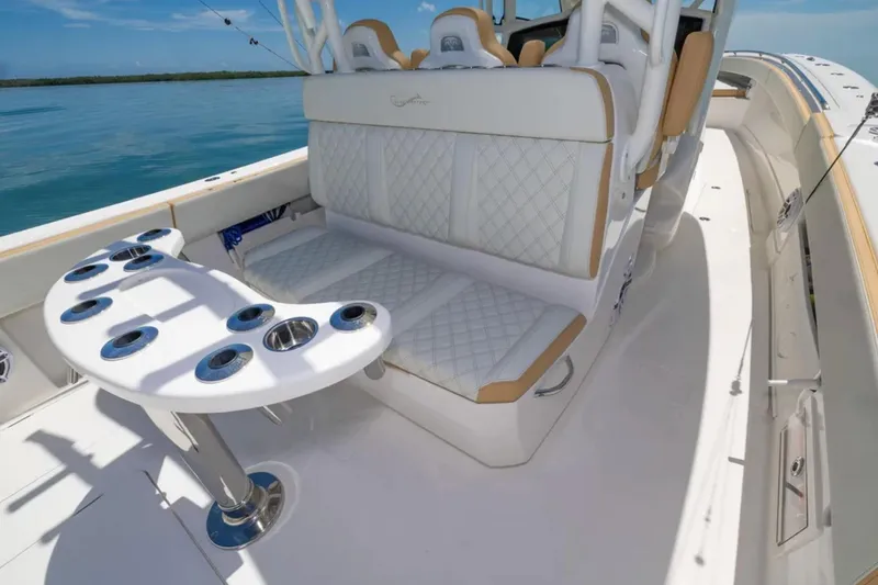Slide: The Image of 2024 Blackwater 43 Sportfish boat interior with luxurious seating and rod holders. - 35