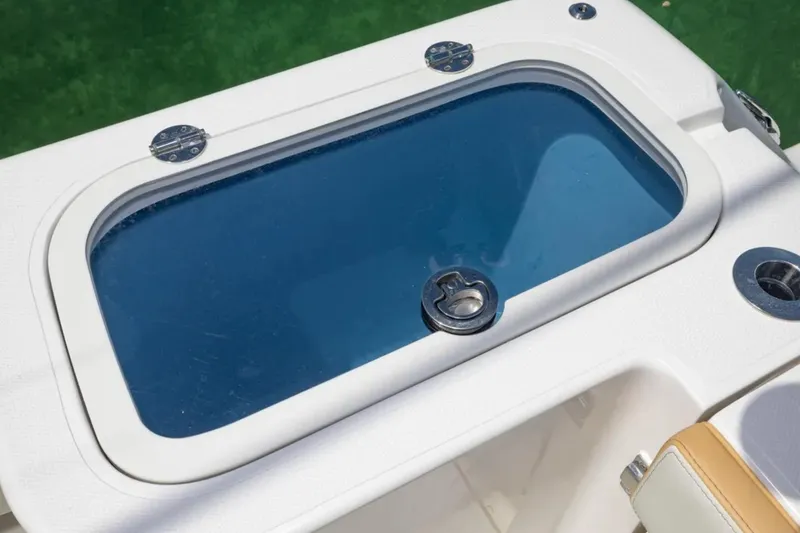Slide: The Image of Livewell on 2024 Blackwater 43 Sportfish boat, featuring a secure latch and sleek design. - 45